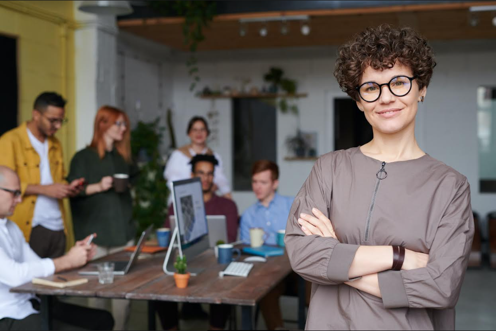 Female-CEO-standing-in-confidence Female-CEO-standing-in-confidence