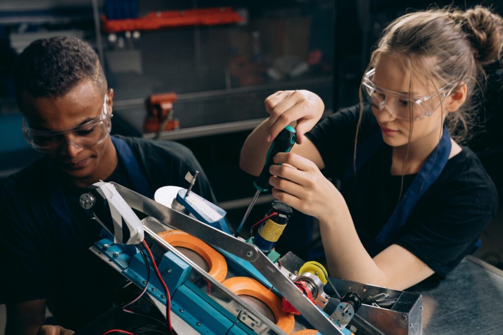 Manufacturing team building a prototype